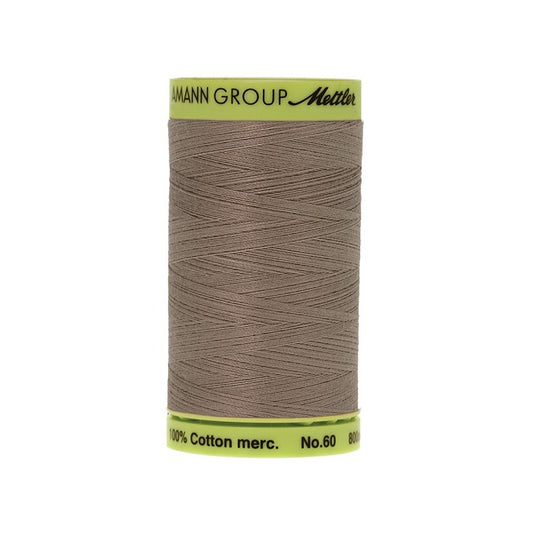 Light brown thread with Mettler Cotton 60 branding.
