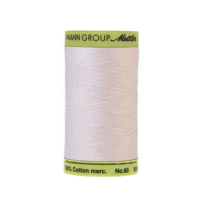 White thread with Mettler Cotton 60 branding.