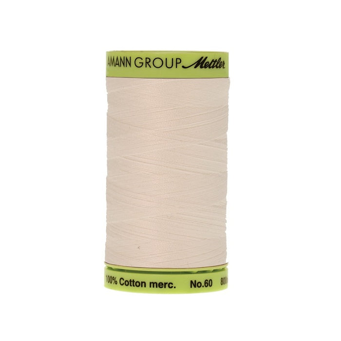 Off white thread with Mettler Cotton 60 branding.