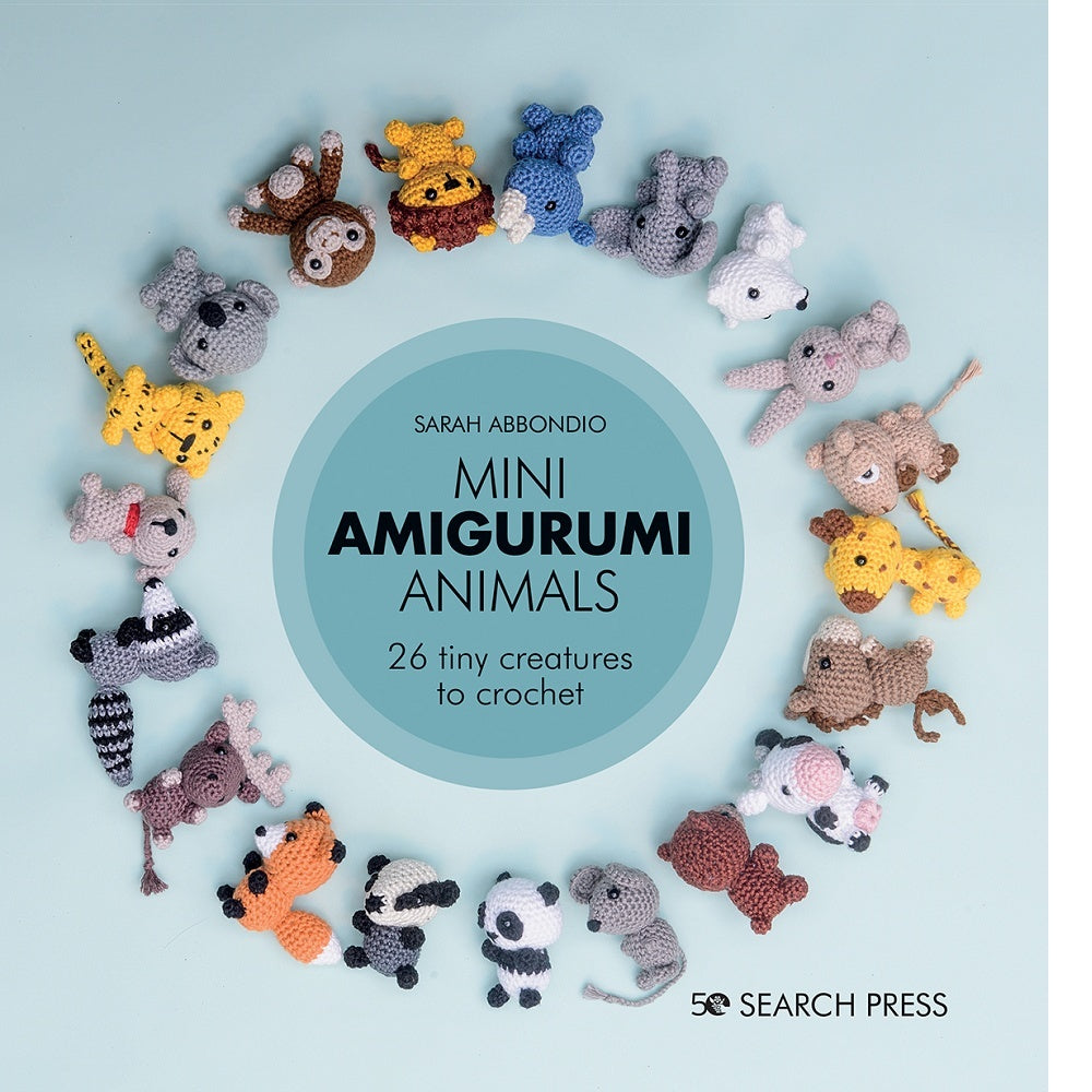 Book cover with small crochet animals arranged around a central circle.