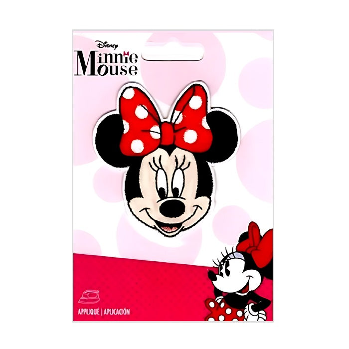 Smiling Minnie Mouse face applique with red bow.