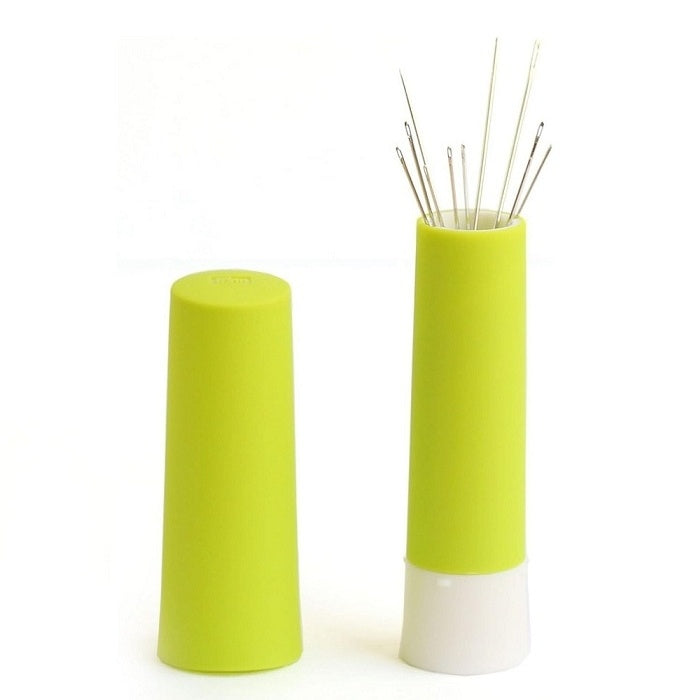 Small green cylindrical needle storage tube with lid.