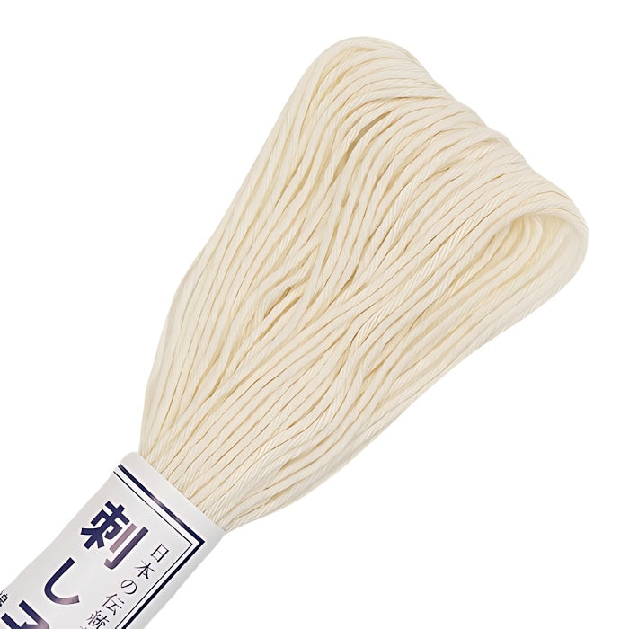 Cream sashiko thread with Olympus branding.