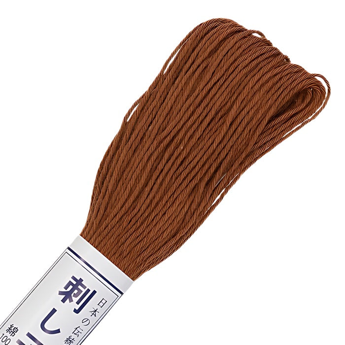Brown sashiko thread with Olympus branding.