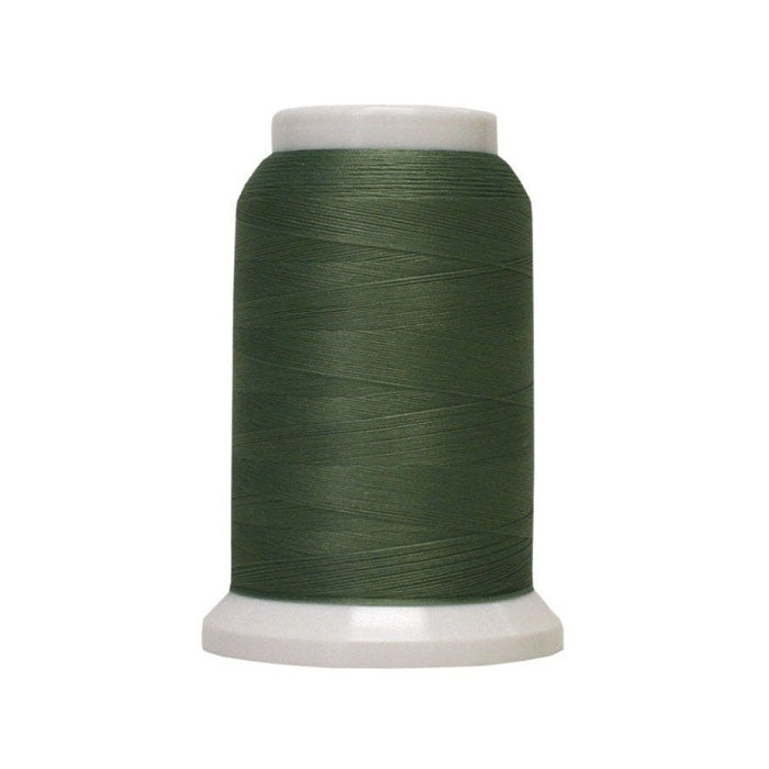 Spool of green woolly poly thread.