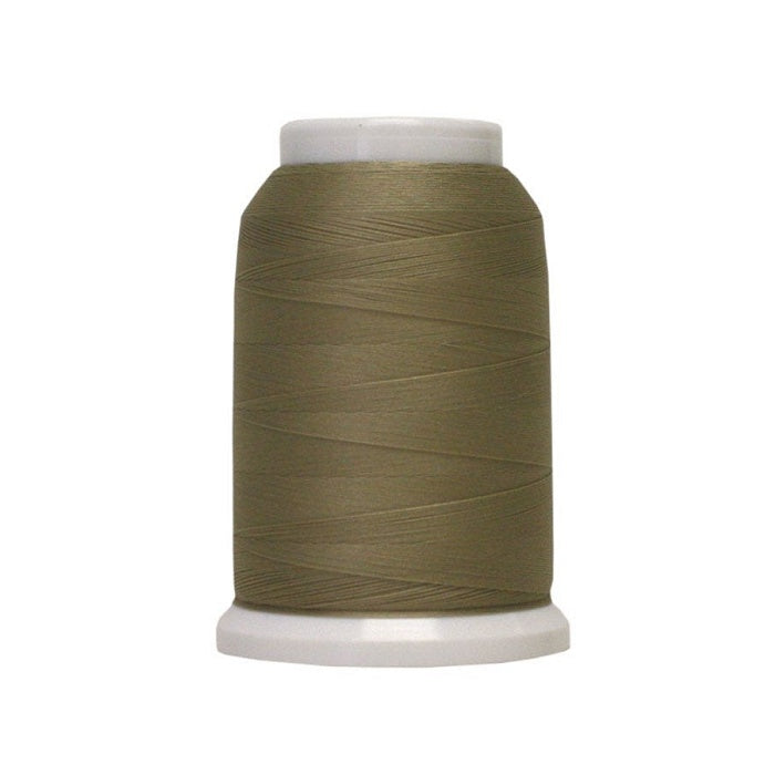 Spool of khaki woolly poly thread.
