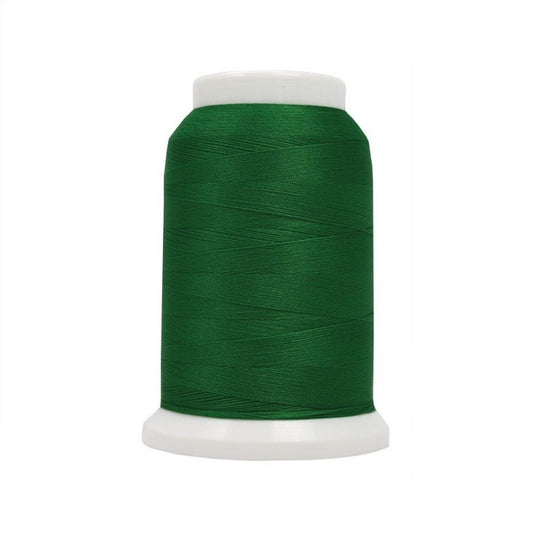Spool of green woolly poly thread.