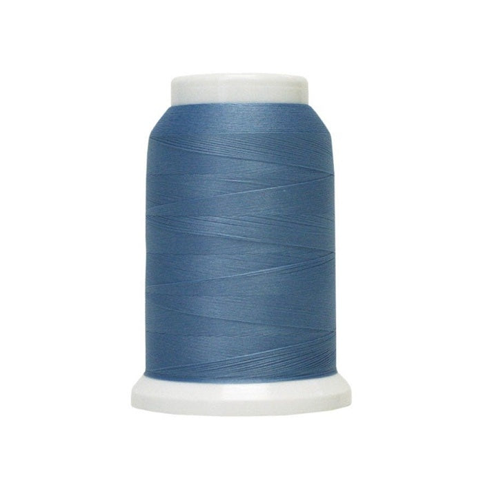 Spool of blue woolly poly thread.