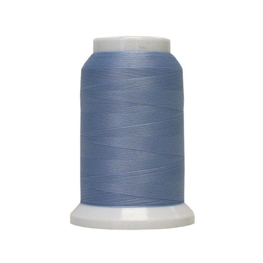 Spool of blue woolly poly thread.
