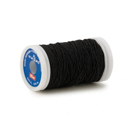 Spool of black sewing elastic.