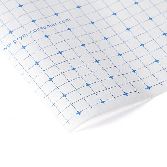 White pattern paper with blue grid lines and Prym branding.