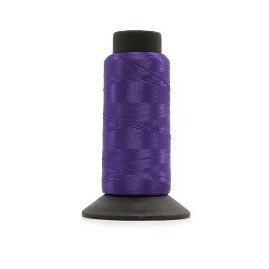 Cone of purple woolly nylon thread.