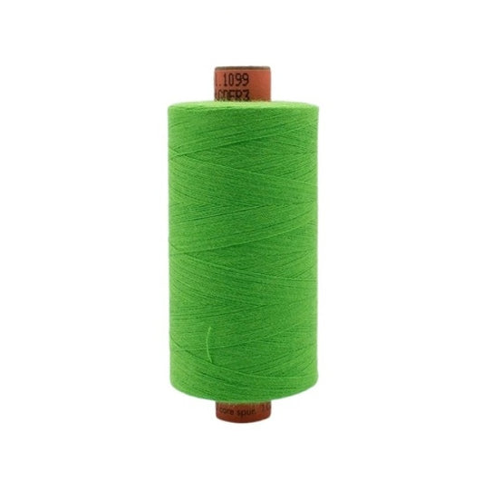 Spool of lime green thread with Rasant branding.