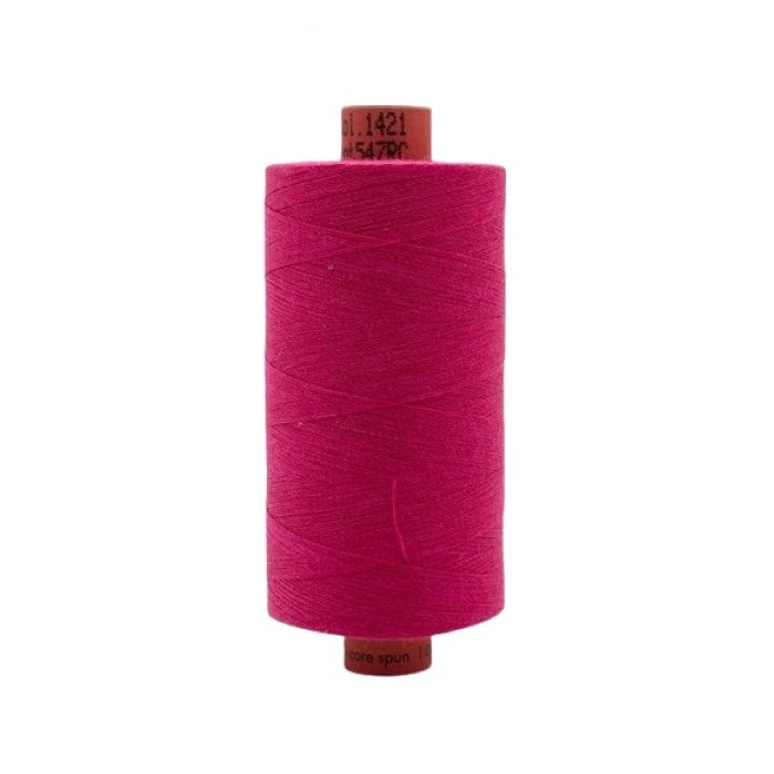 Spool of hot pink thread with Rasant branding.