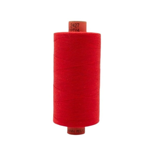 Spool of red thread with Rasant branding.