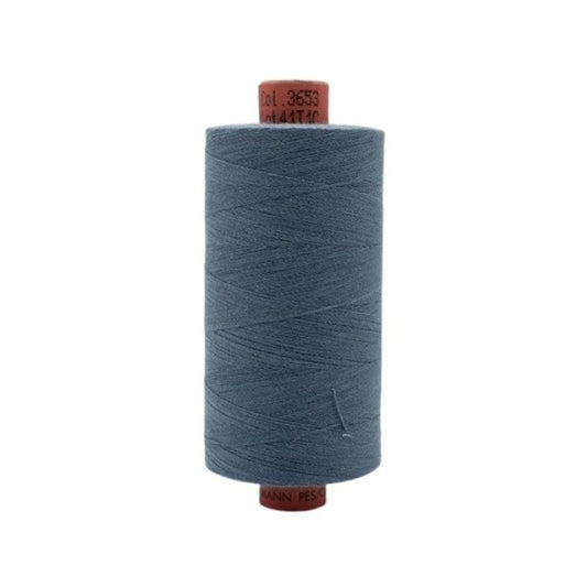 Spool of dark slate blue thread with Rasant branding.