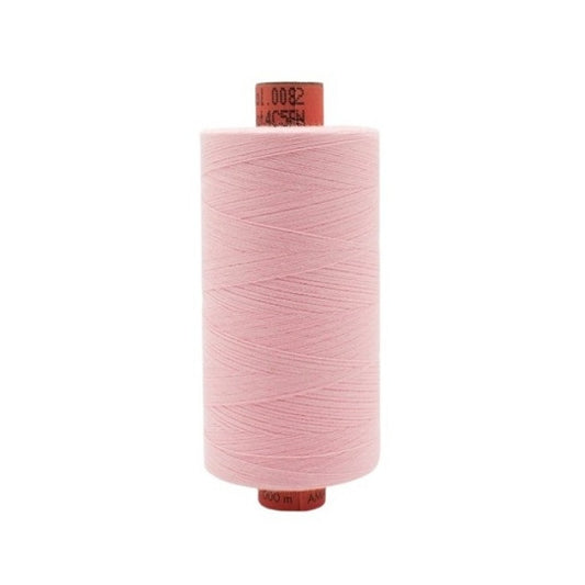 Spool of pink thread with Rasant branding.