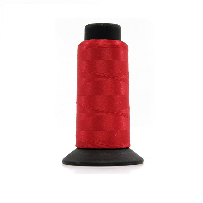 Cone of red woolly nylon thread.