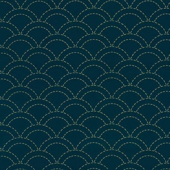 Staggered upside down half circle wave pattern on blue fabric.