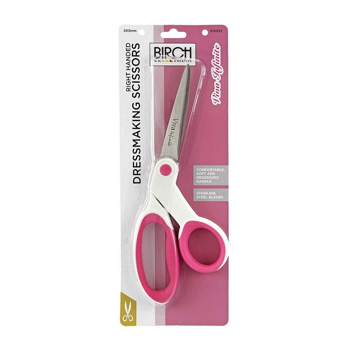 Right handed sewing scissors with pink and white handles.