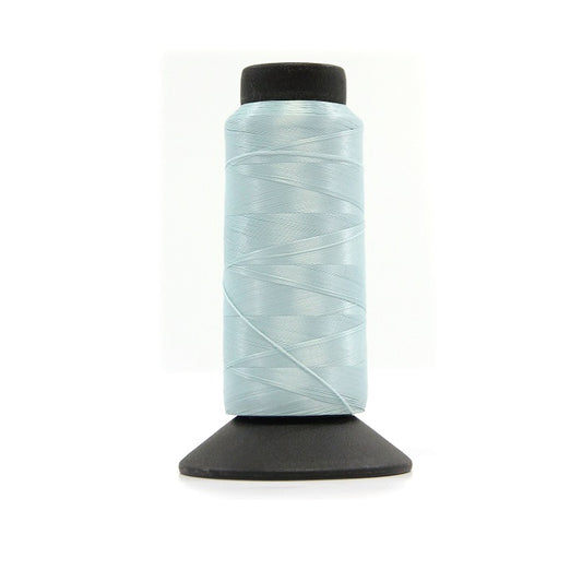 Cone of sky blue woolly nylon thread.