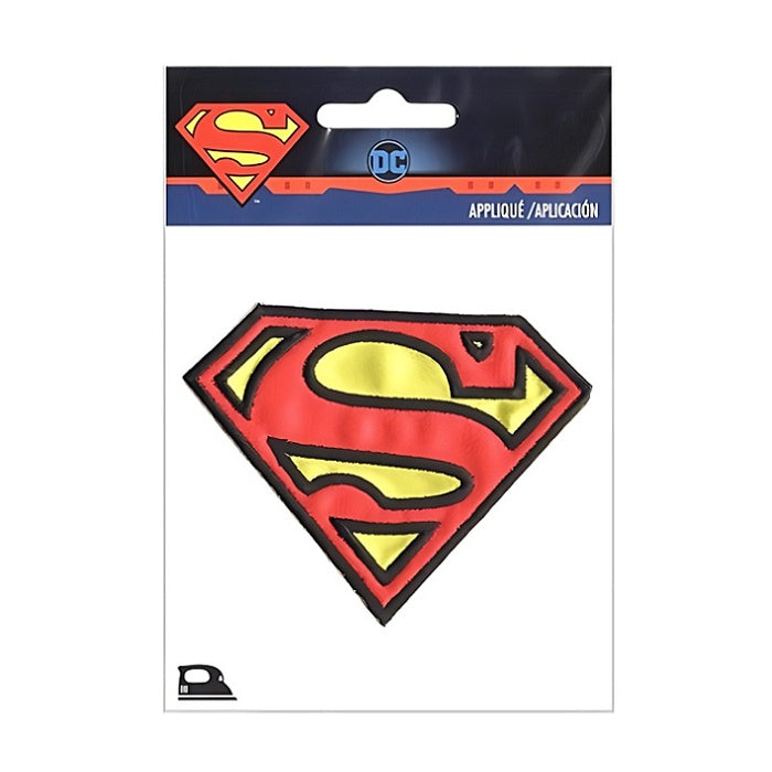 Superman logo patch in packaging with DC Comics branding.