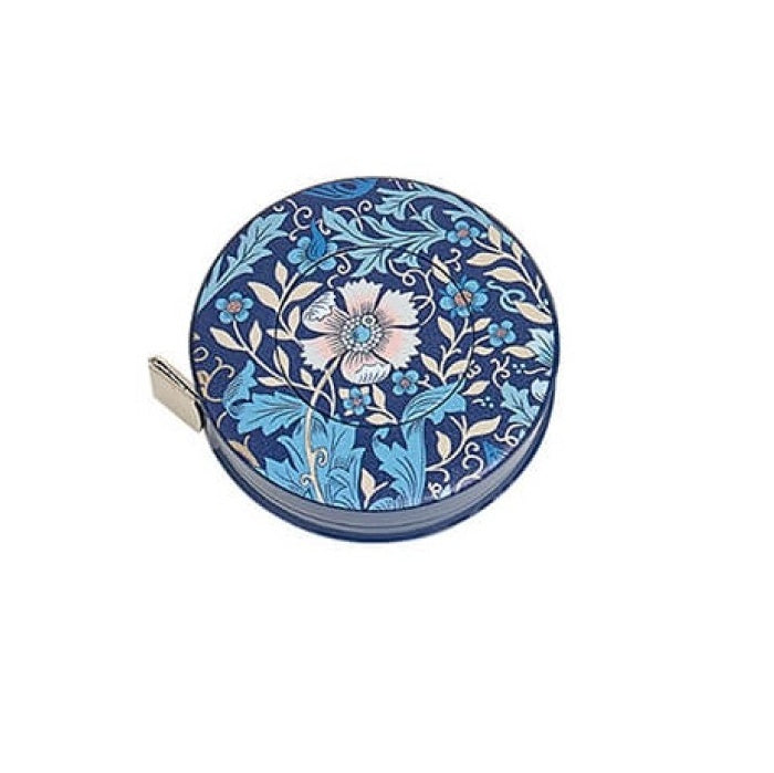 Tape measure cover with flowers and leaves on a blue background.