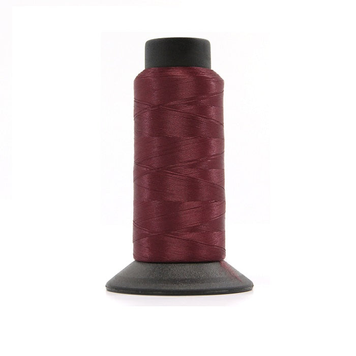 Cone of burgundy woolly nylon thread.