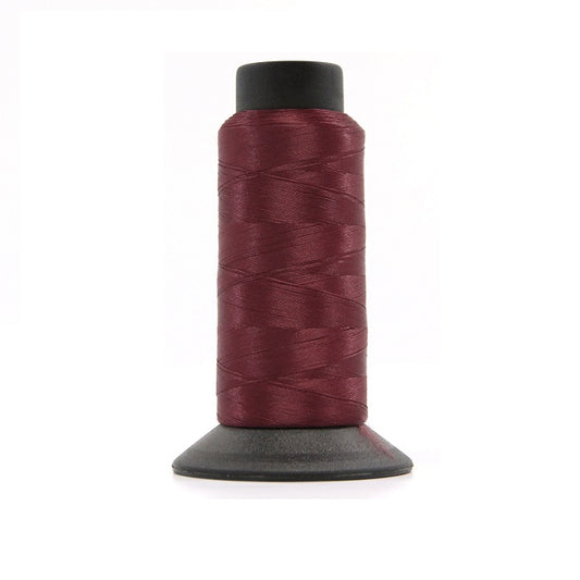 Cone of burgundy woolly nylon thread.
