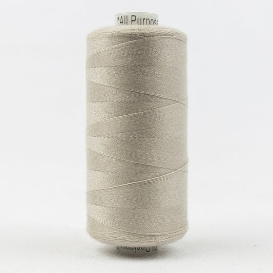 Spool of palest beige thread with Designer branding.