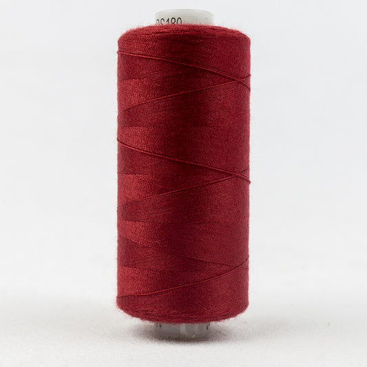 Spool of cherry red thread with Designer branding.