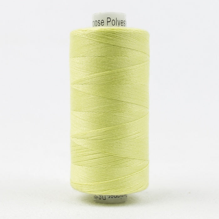 Spool of light mint green thread with Designer branding.