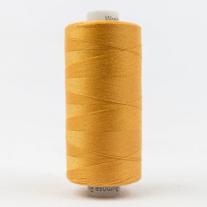 Spool of orange thread with Designer branding.