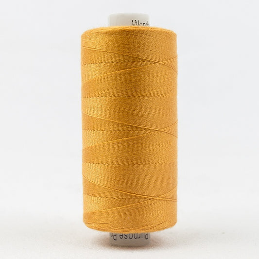 Spool of orange thread with Designer branding.