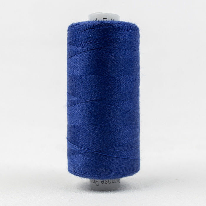 Spool of blue thread with Designer branding.