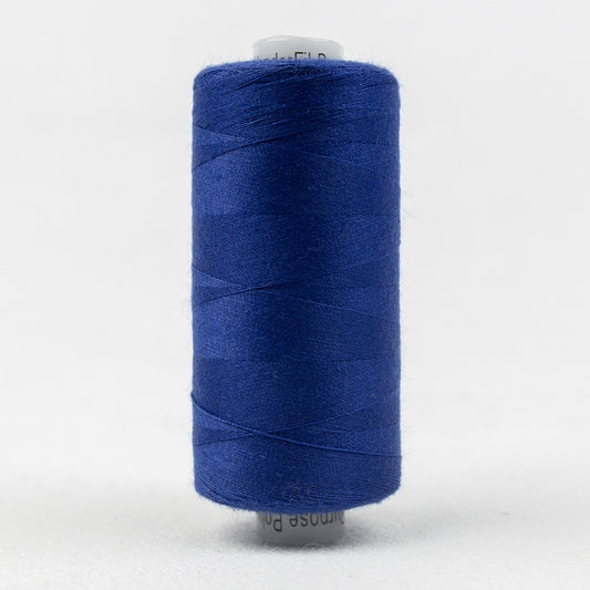 Spool of blue thread with Designer branding.