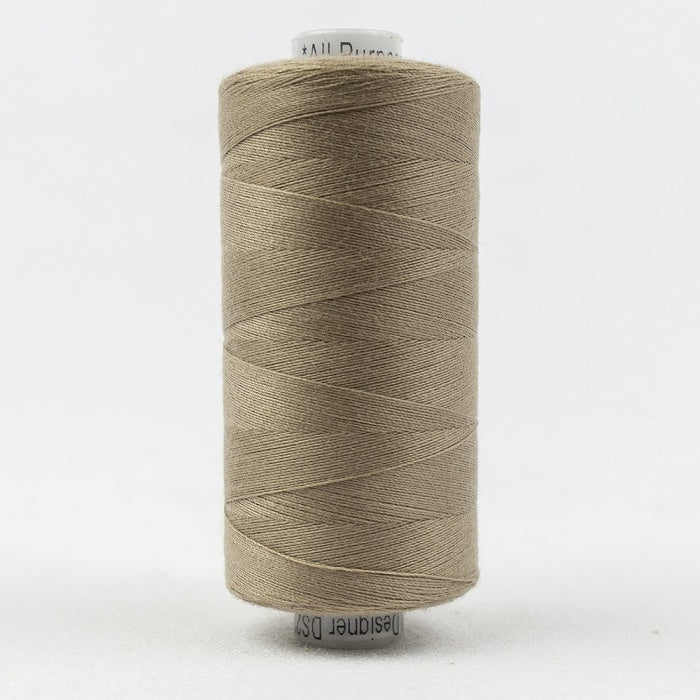 Spool of light taupe thread with Designer branding.