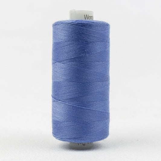 Spool of blue thread with Designer branding.