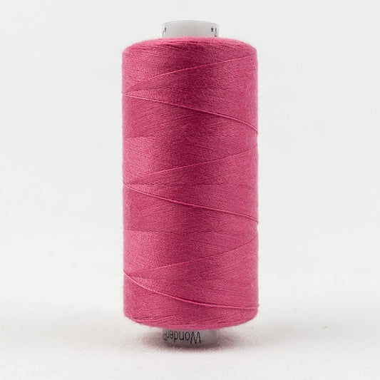 Spool of dark pink thread with Designer branding.