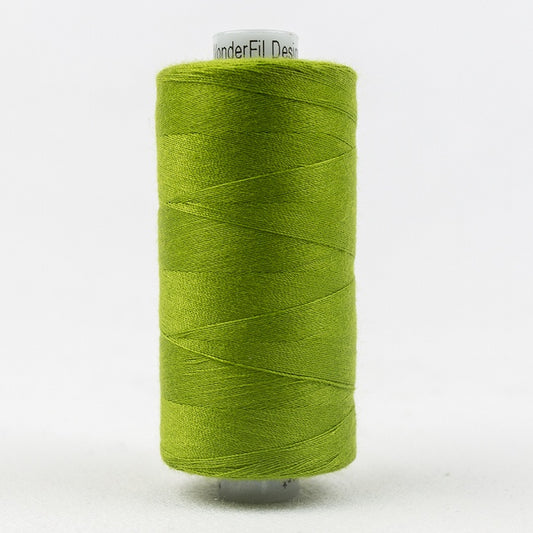 Spool of green thread with Designer branding.
