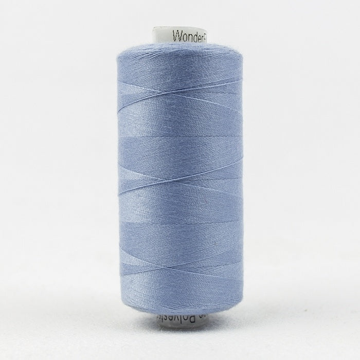 Spool of pale mid blue thread with Designer branding.