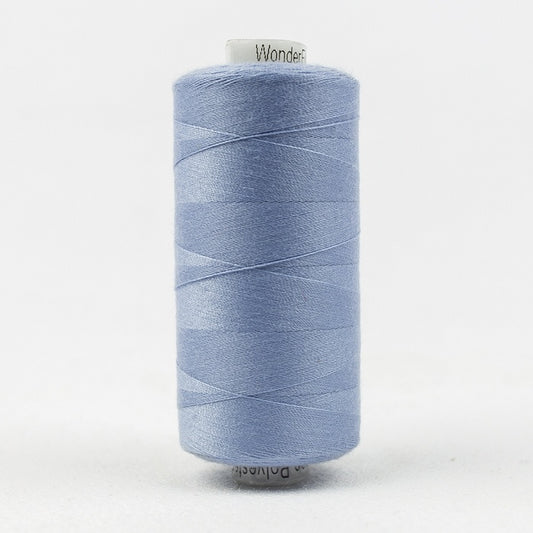 Spool of pale mid blue thread with Designer branding.