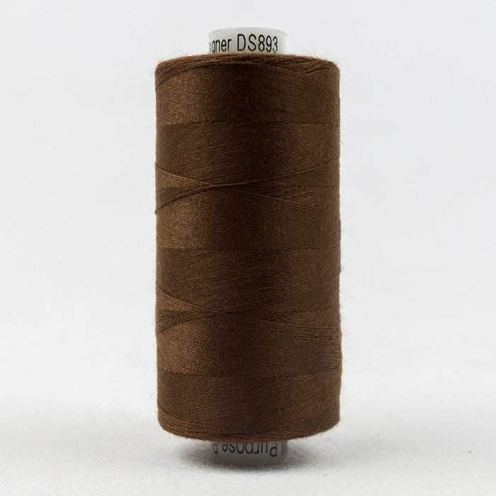 Spool of dark brown thread with Designer branding.